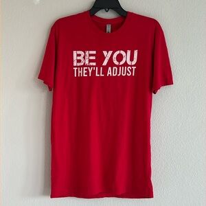 Next level apparel T-shirt “BE YOU THEY’LL ADJUST”, color Red, size Medium
